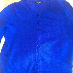 Blue cardigan sweater.